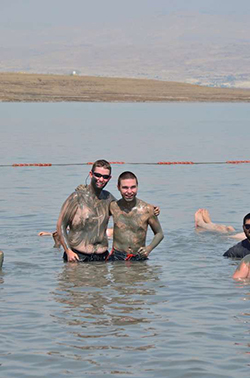 Students having fun in the Dead Sea