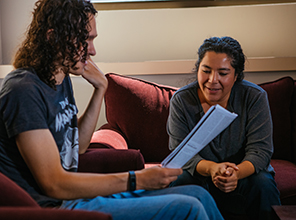 Student working with a professor