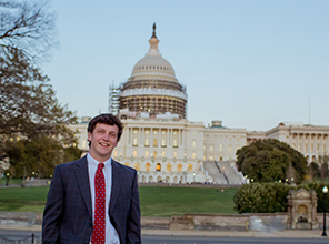 Student in front of the Capitol building