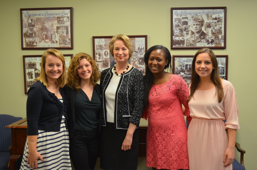Students with a government official