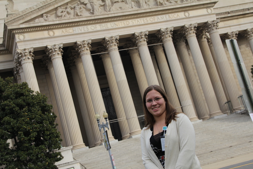 Student outside a building in Washington, D.C.