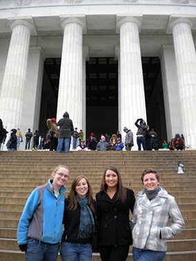 Students outside a memorial