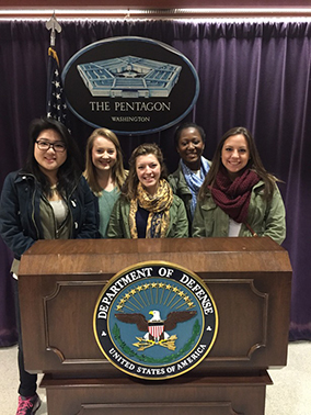 Students behind the Department of Defense podium