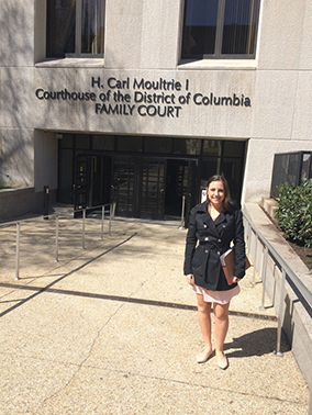 Student in front of the Family Court building