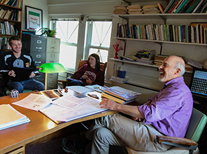 Students meeting with a professor