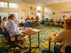 Students having a discussion in class