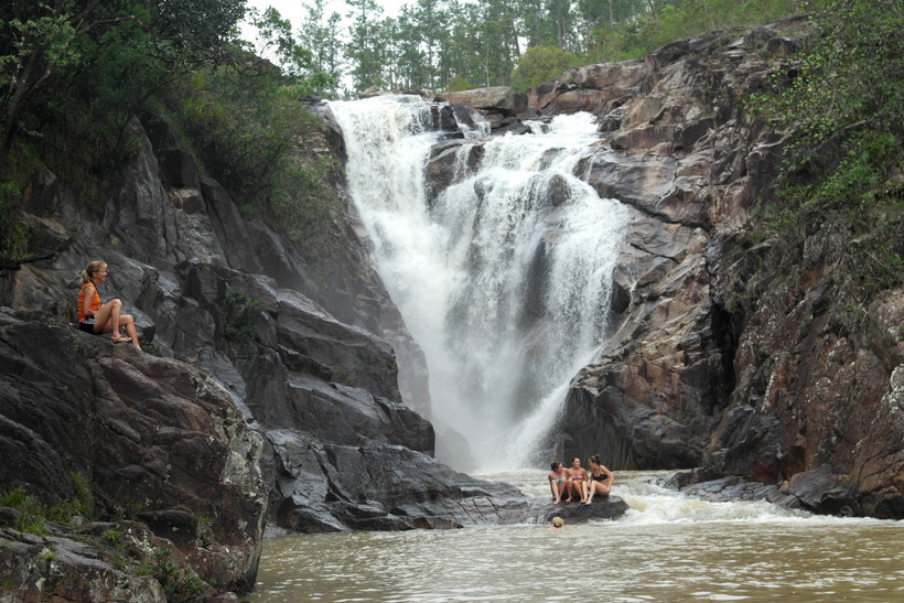 Students at a waterfall
