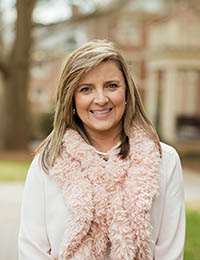 Headshot of Paola Brinkley