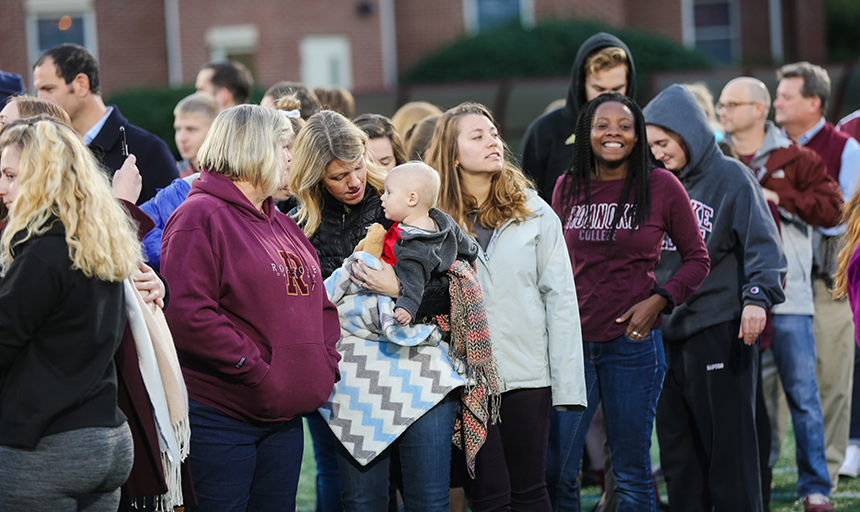 Students and Alumni on Kerr Stadium Field