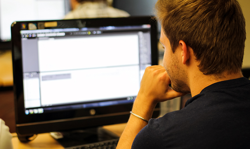 Man looking at computer screen