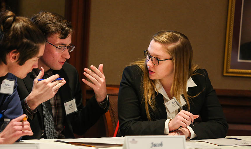 students talking at the Ethics Bowl