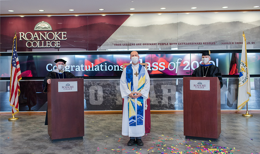 College officials wearing masks at ceremony