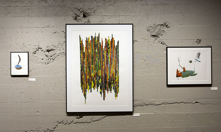 Three colorful pieces of art in frames