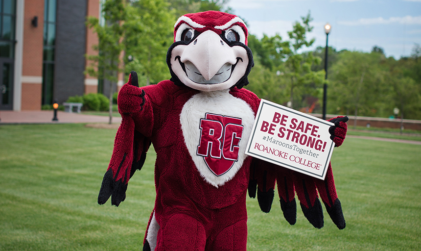 Rooney mascot with Be Safe sign