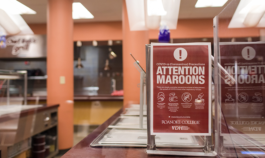 Poster in dining hall reminding students of safety measures