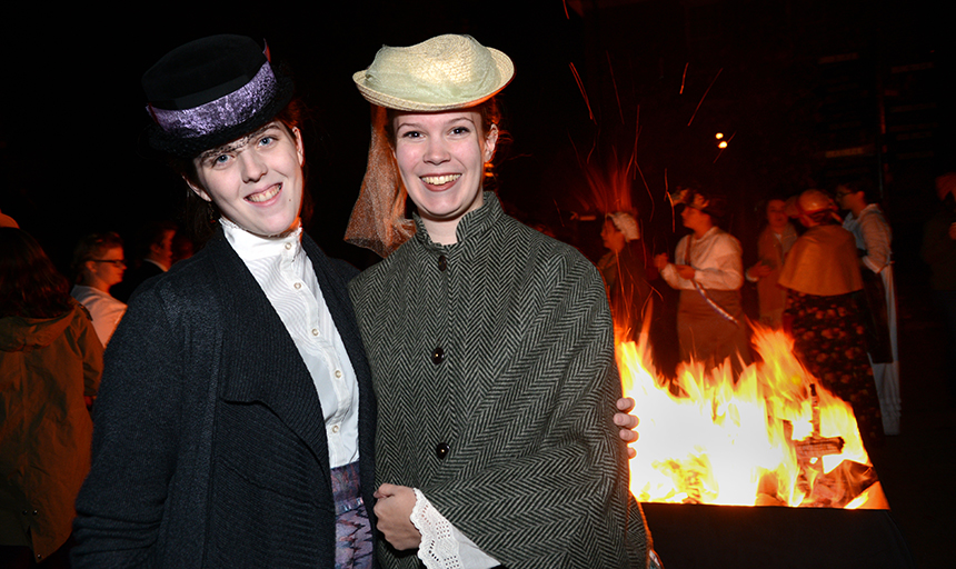 Two students dressed as suffragettes