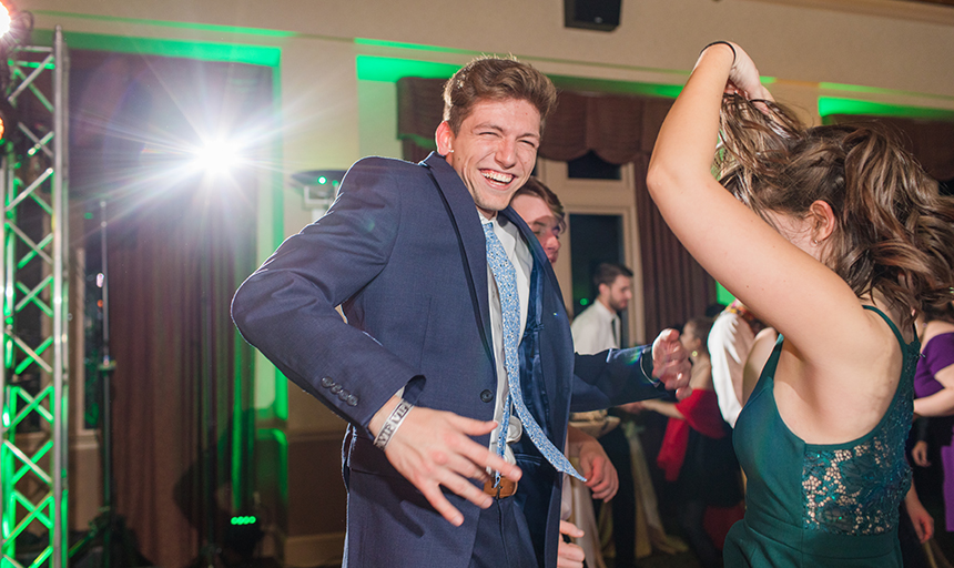 Students dancing and smiling