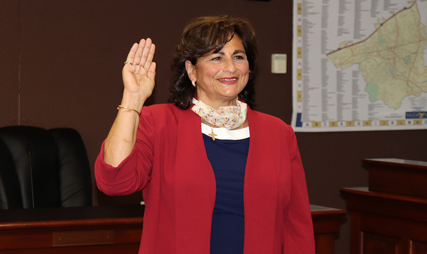 Woman takes oath of office