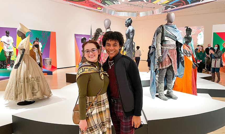 Two students smiling at museum