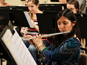 student playing instrument