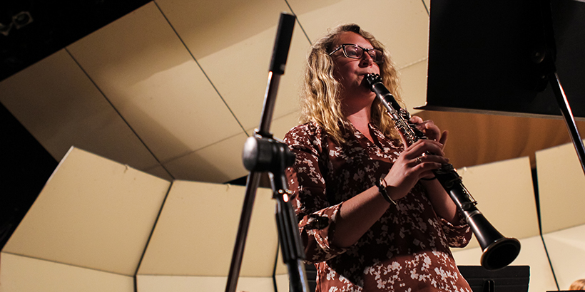 Woman playing oboe