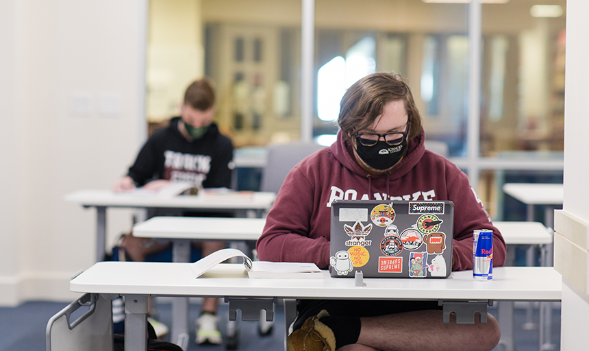 students in class, wearing face coverings