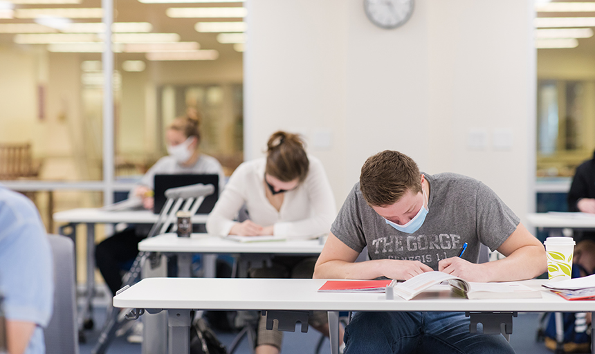 students in a classroom wearing face masks