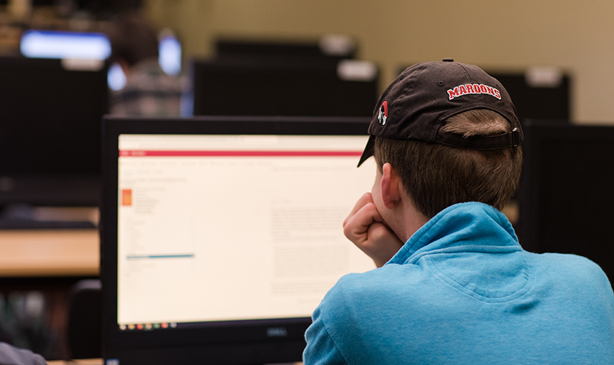 student working at computer