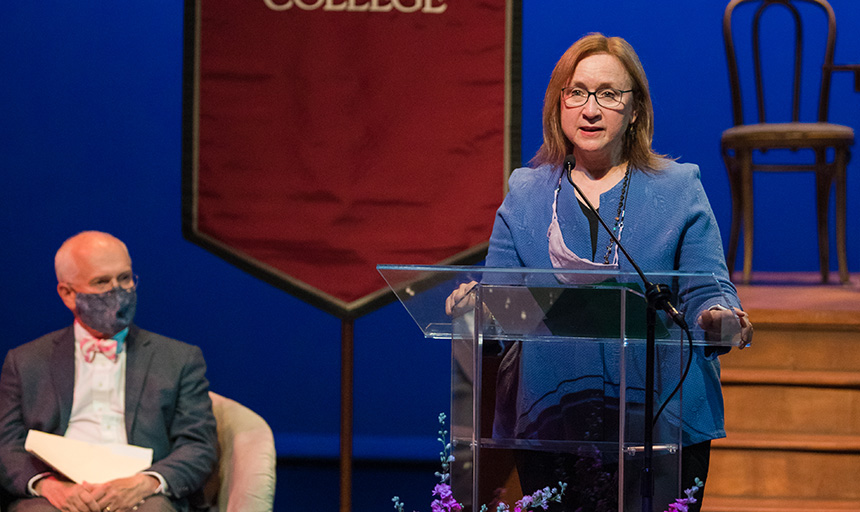 Dr. Lisa Warren speaks at podium