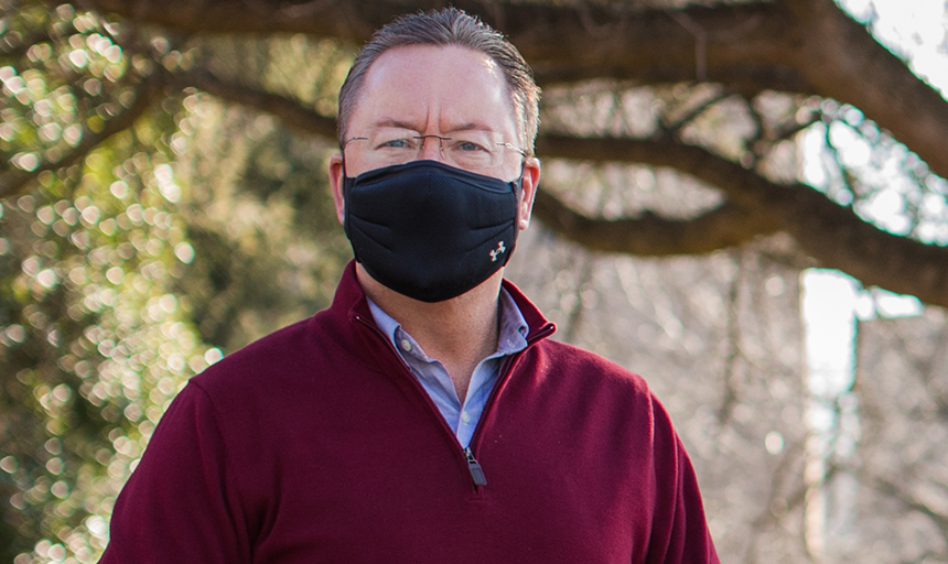 Dean of Students Tom Rambo wearing a mask