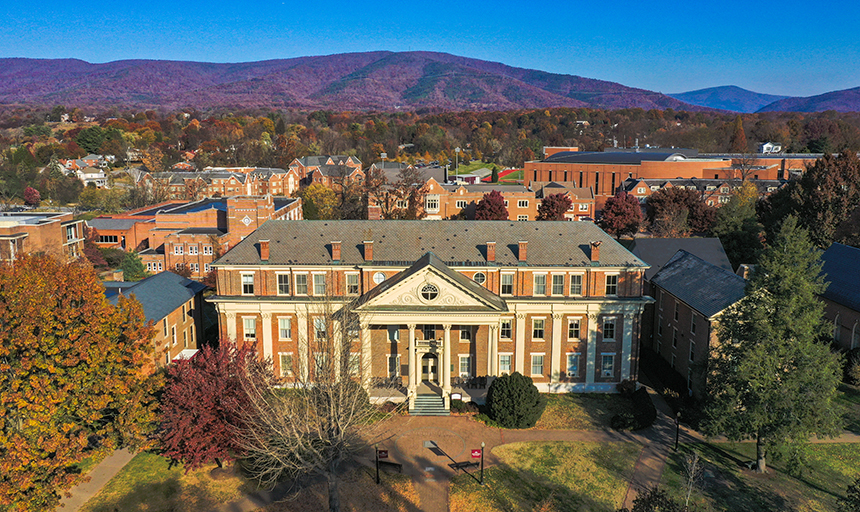 Administration Building with bright blue sky and mountain in background