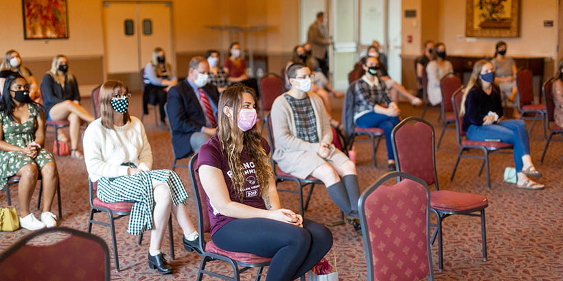 Students sitting in the ceremony