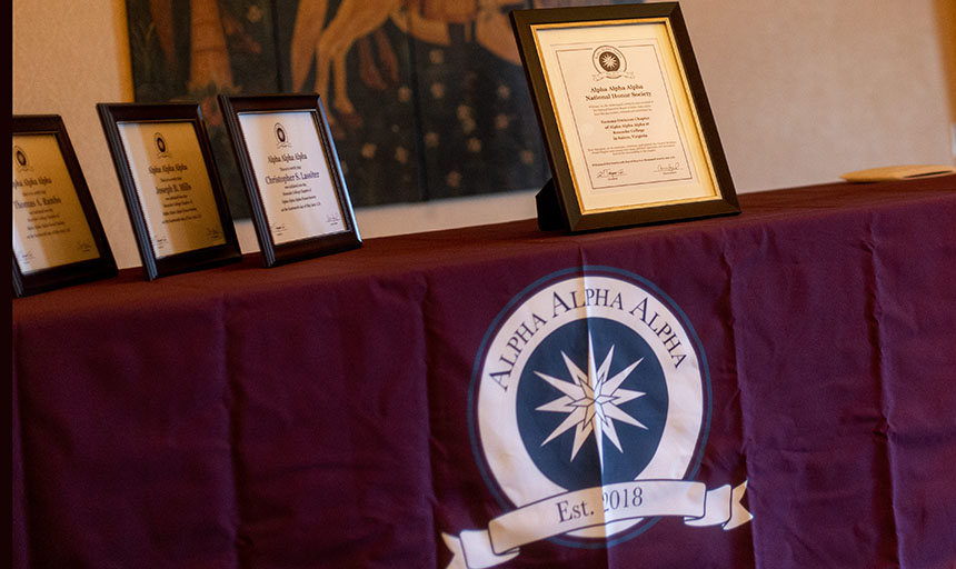 TriAlpha ceremony table with certificates