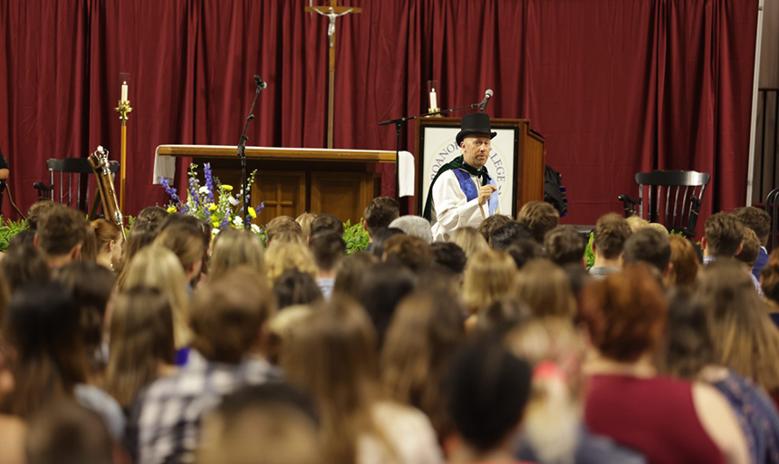 The Rev. Christopher Bowen speaks to graduates