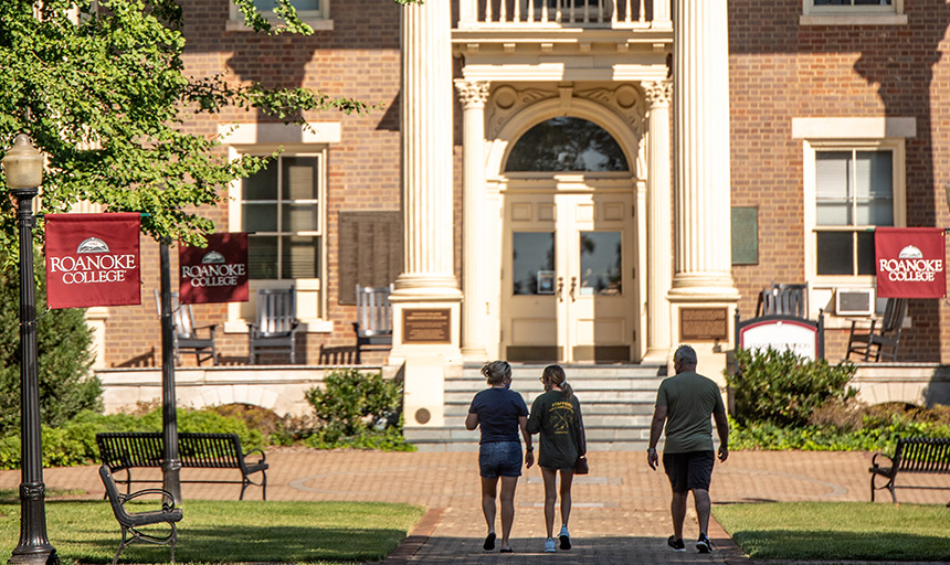 Students walk in front of Administration Building