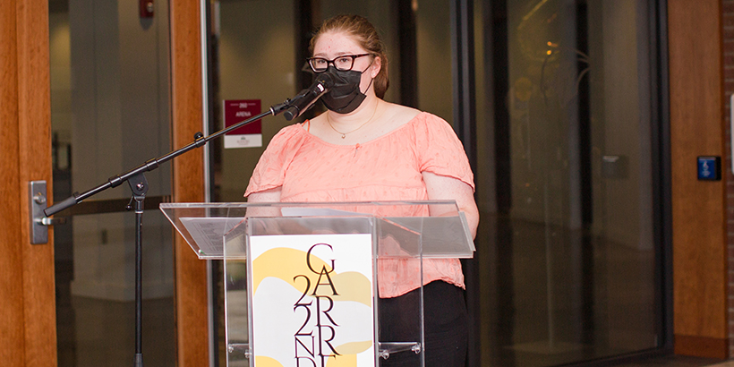 Caitlin Blake at podium