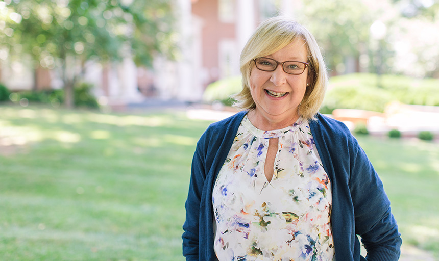 Jenny Rosti stands on campus