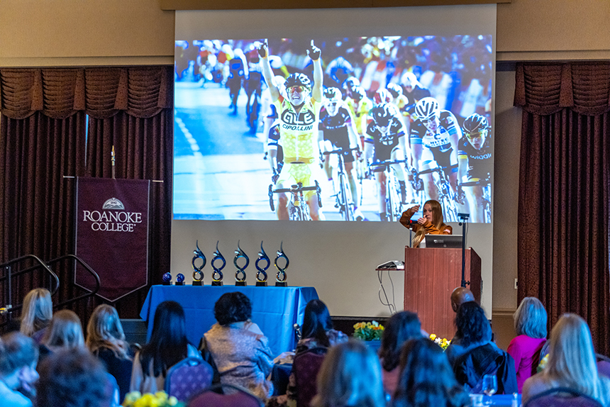 room full of people watches presentation about cycling