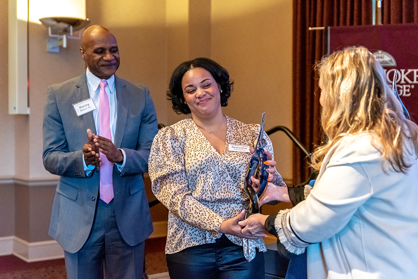 woman accepting award