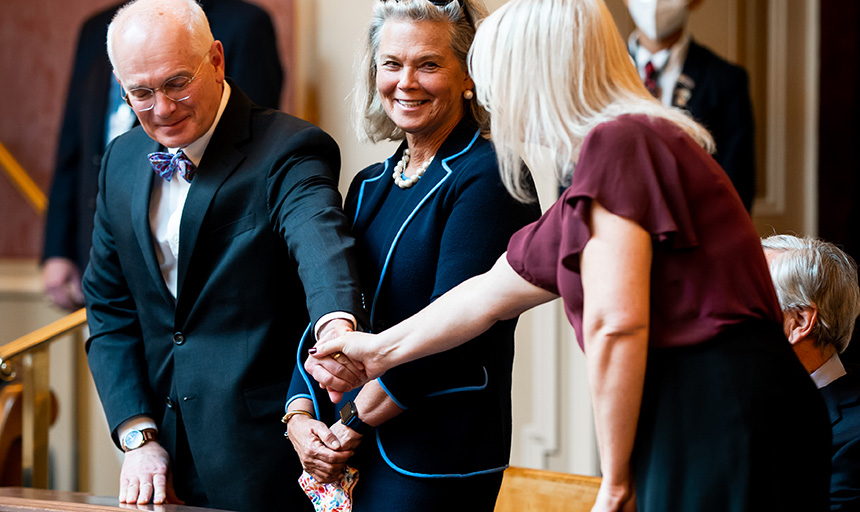 President Maxey shakes hands with Nicole Riley as she is introduced. 