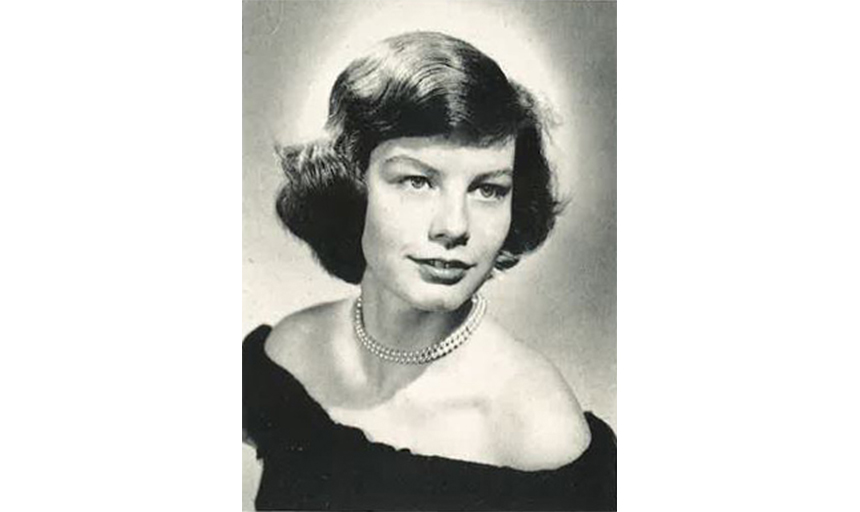 Peggy Patrick. woman from 1951 yearbook with dark top and dark hair