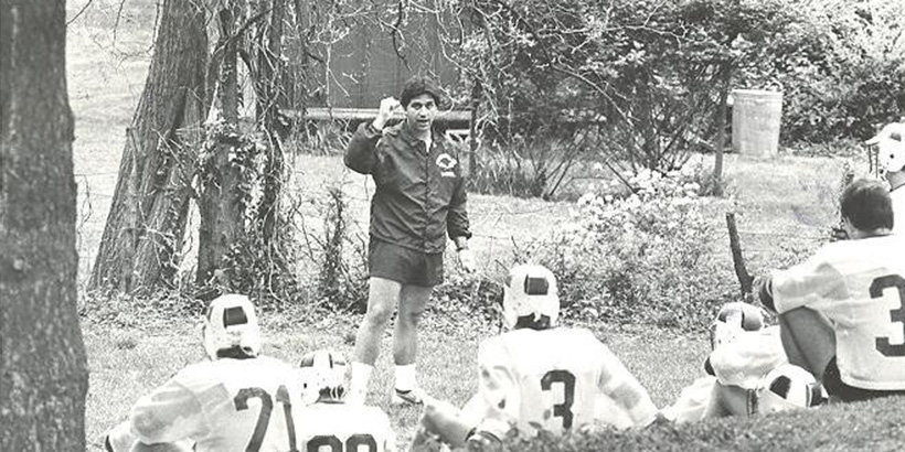 Roanoke lacrosse Coach John Pirro talking to players