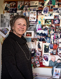 Leah Russell with photo board behind her