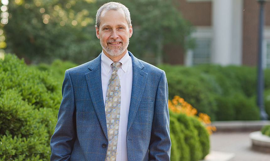 Rich Grant stands in front of Fintel Library