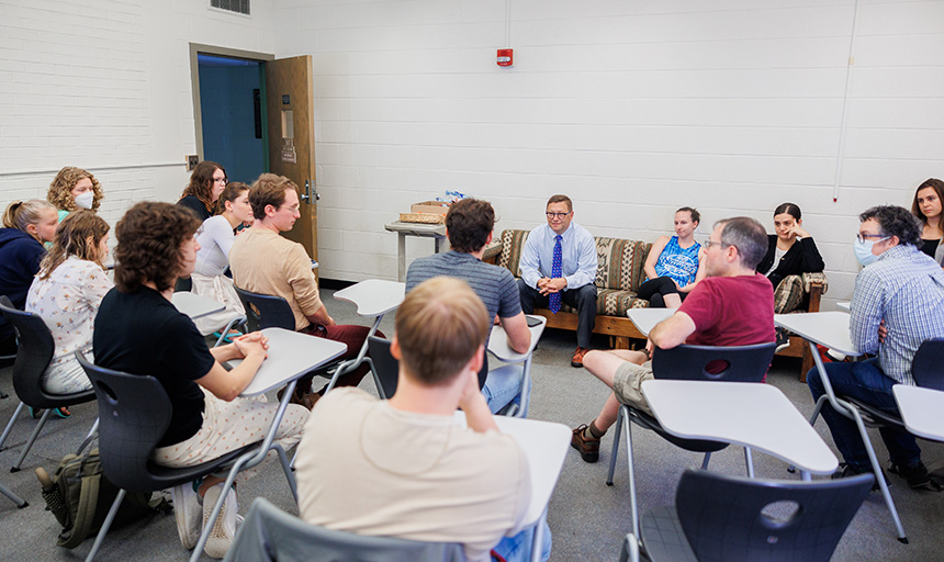 President Shushok meeting with summer scholars in classroom