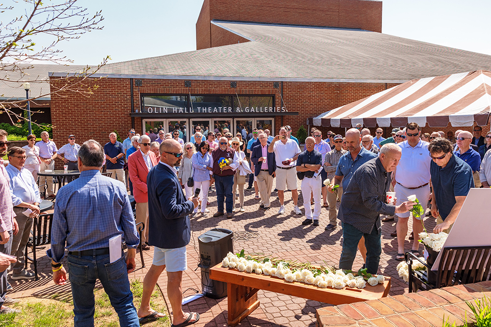 People gathered in Olin Hall courtyard on sunny day