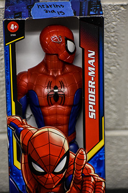 A Spider-Man action figure was modified to include a hearing aid.