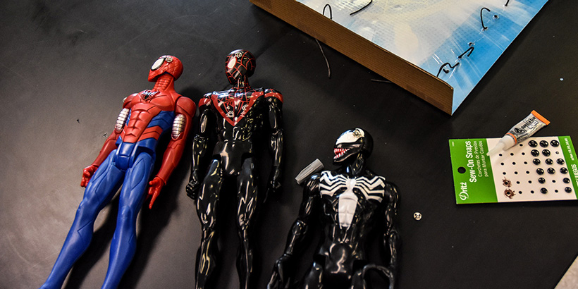 Cochlear implants, represented by small silver magnets, were added to action figures of Spider-Man, Venom and other characters.