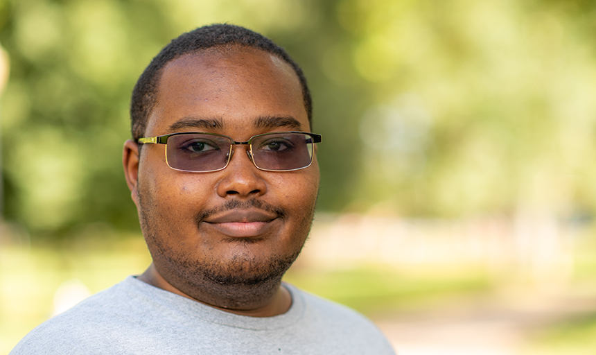 Vashawn Gray stands outside