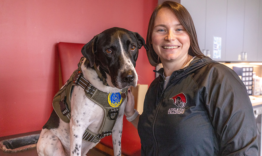 Milo with his mom, Head Athletic Trainer Gabi Oney '17